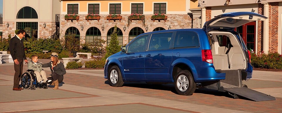 rear entry dodge wheelchair van with its owners