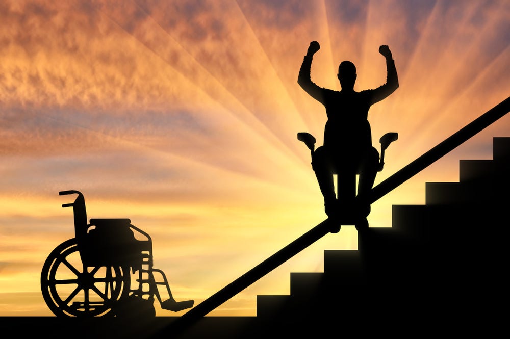 Happy disabled person climbs on elevator for disabled on stairs. Concept disabled lift, elevator, handicap