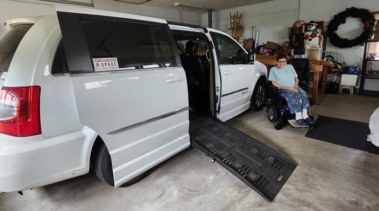 woman in wheelchair with accessible braunability van