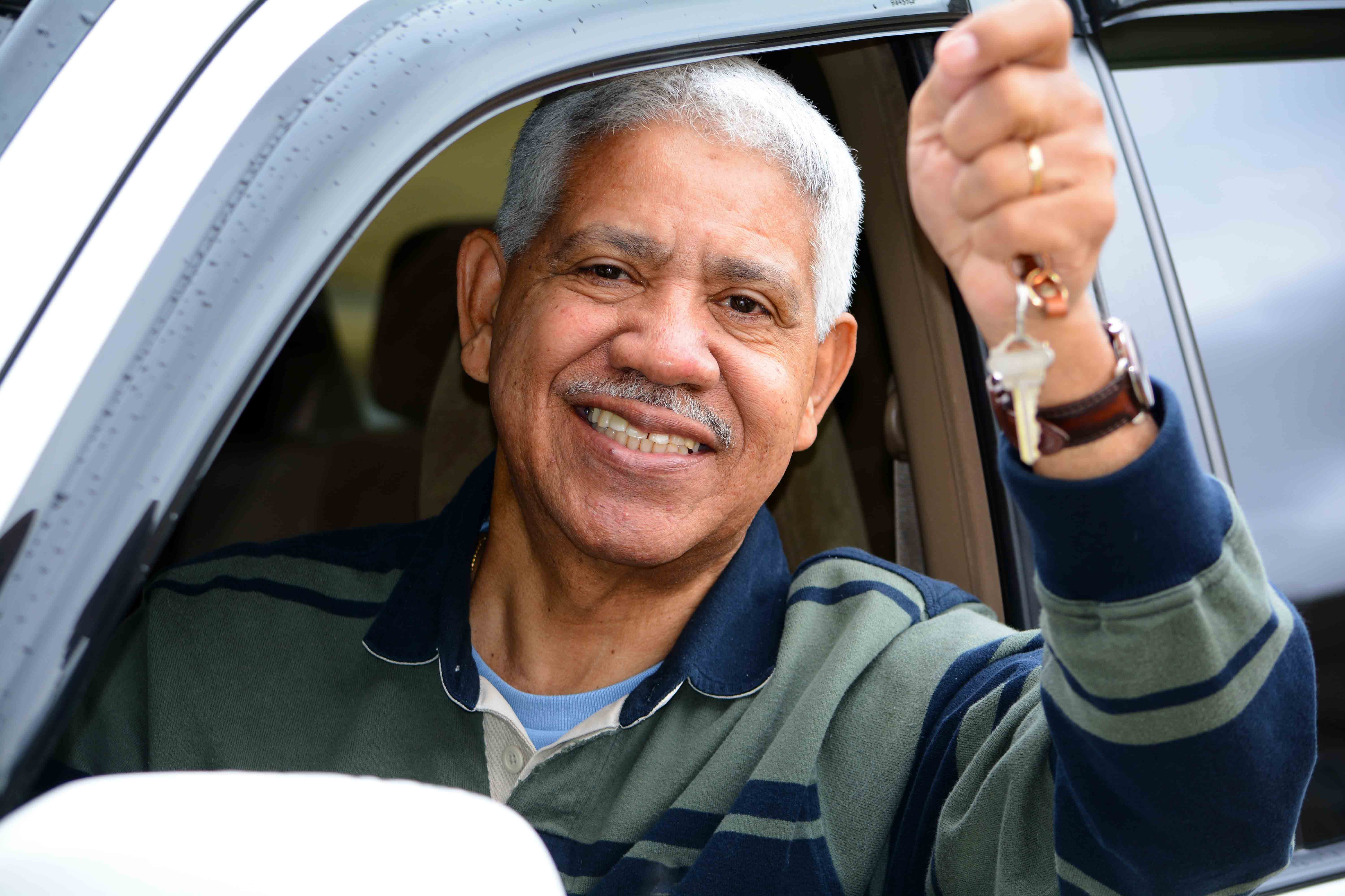 man with keys to wheelchair accessible vehicle