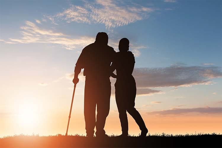 a caregiver or caretaker taking care of someone close to her